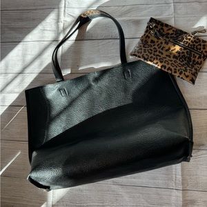 Women’s black purse / “tote” with cheetah lining.
